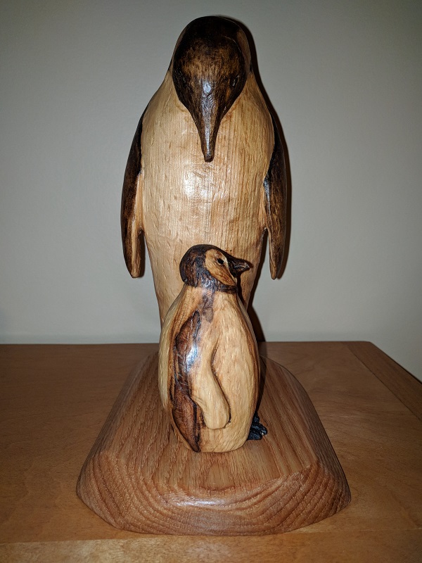 penguin wood carving