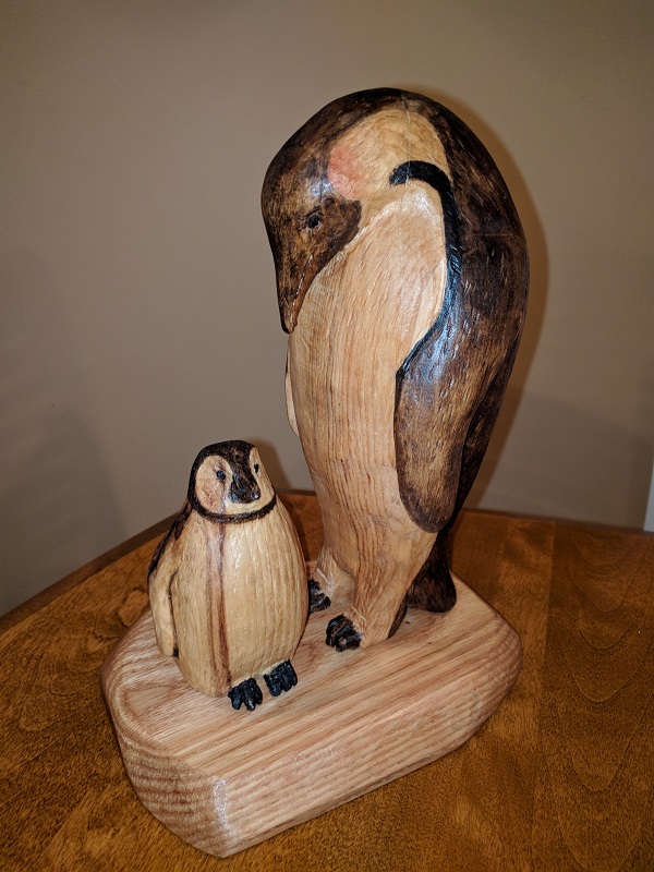 penguin wood carving